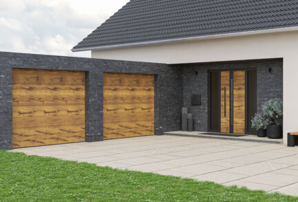 Segmentowa brama garażowa LPU 42 z profilem ThermoFrame będzie skutecznym strażnikiem ciepła w większości domów jednorodzinnych 